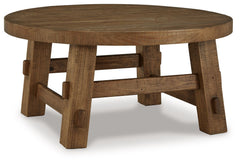 Mackifeld - Round Cocktail Table - Warm Brown