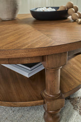 Chadworth - Round Cocktail Table - Medium Brown