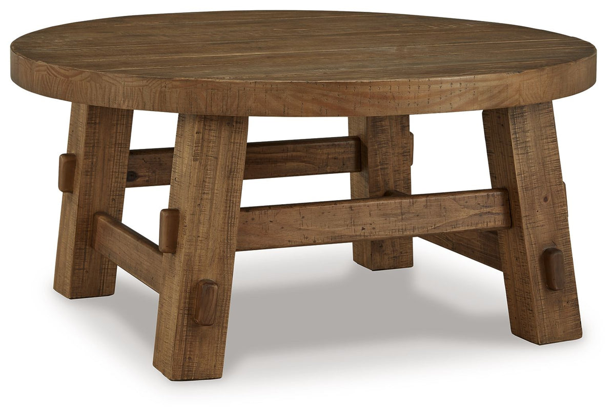 Mackifeld - Round Cocktail Table - Warm Brown