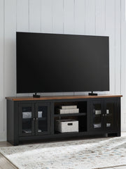 Wildenauer - XL TV Stand With Fireplace Option - Brown / Black